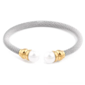 Open cuff victorian pearl gothic bracelet with silver and gold metalwork, front view displaying perfectly round white pearls