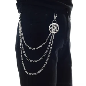 Gothic pentagram waist chain worn on black trousers, side rear view showing triple-layer silver metal chains with pentagram pendant in action