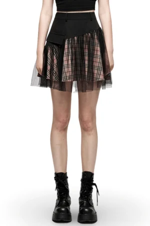 High-waisted black pink plaid gothic mini skirt with mesh overlay worn by model in front view with black crop top and combat boots