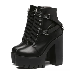 Black gothic lace-up platform ankle boots with decorative buckle straps front 3/4 view - chunky block heel and square platform silhouette