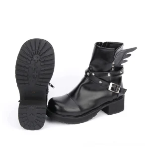 Gothic ankle boots side sole view displaying thick rubber outsole, inner zipper closure, and wing accent details on black PU leather