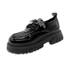 Black glossy patent leather gothic platform loafers with shiny finish, front three-quarter view displaying thick lug sole and metal chain trim