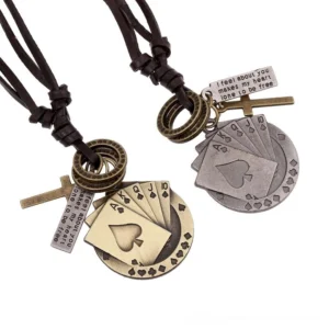 Gothic poker card cross pendant necklace with dual metal tones, spade charm, sacred cross and engraved quote tag on white background