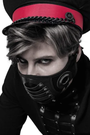 Gothic punk leather face mask featuring round metal grommets and rivet details, frontal angle with military-style cap styling
