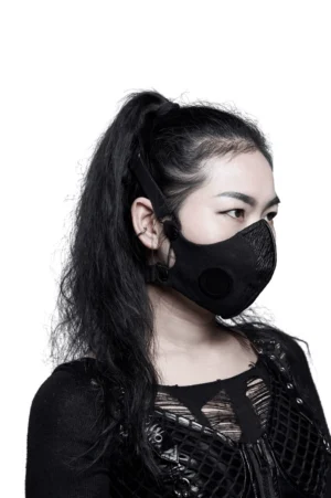 Punk style black woven face mask with adjustable strap and filter vent detail, side profile on model