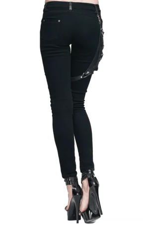 Women's black gothic trousers rear view showing slim fit silhouette and side strap accessory pouch
