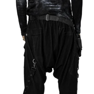 Black gothic riveted thigh waist bag rear view with adjustable straps and side pockets, worn by model in cargo pants