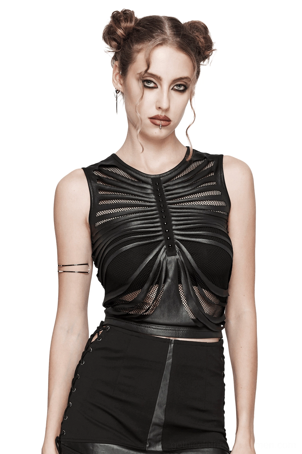 Gothic black ribcage mesh crop top sleeveless front view on model with double space buns, white studio background