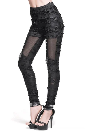 Black gothic ripped leggings front three-quarter view showing mesh thigh panels and distressed tattered fabric on model