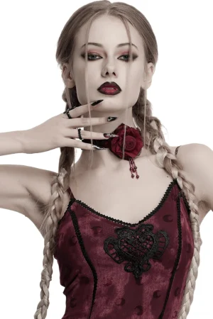 Gothic rose choker on model wearing wine red camisole with heart embroidery and dark makeup