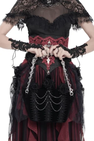 Gothic handbag displayed on model wearing formal gothic gown, front view showcasing layered lace chains and ornate decorative elements