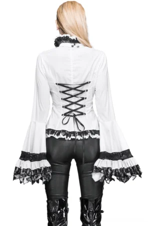 Back view of gothic Victorian blouse showing corset lace-up closure and ruffled lace-trimmed bell sleeves, worn by model