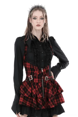 Black gothic ruffled blouse with double-row front placket worn by model, front full-body view showing dramatic ruffle details and metal buttons