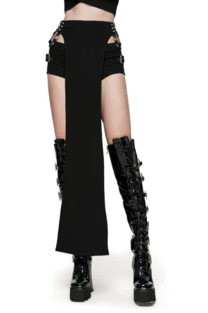 Front view of black gothic shorts and removable high-slit maxi skirt set with metal hardware on model
