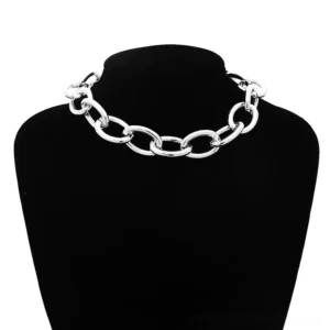 Silver chunky link chain choker necklace with circular pendant worn on black mannequin