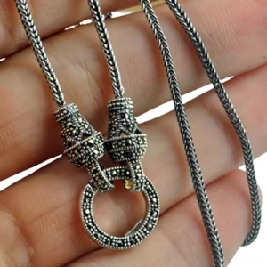 Vintage marcasite stone clasp detail on S925 silver necklace chain, hand close-up showing oxidized antique finish