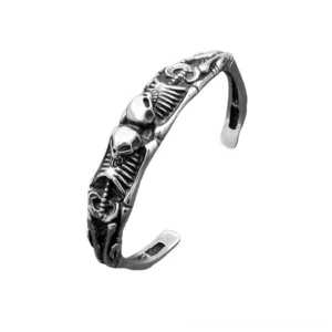 gothic skeleton cuff bracelet stainless steel with embossed skull and bone details vintage style side view