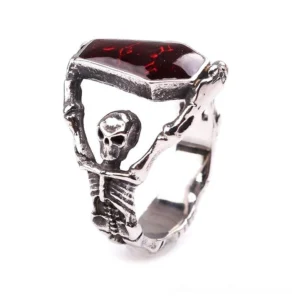 Alternative gothic skeleton ring side view displaying vintage silver tone finish and detailed skeletal artwork with red coffin-shaped stone