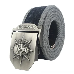 Dark striped gothic canvas belt with silver spiked skull danger buckle - front view