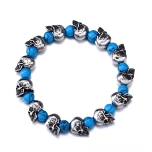 Antique silver skull beaded elastic gothic bracelet with blue turquoise accents flat lay view