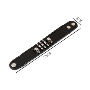 Skull leather gothic bracelet sizing reference, flat lay showing 23cm total length and 3cm width with black braided leather and metal decorations on white background