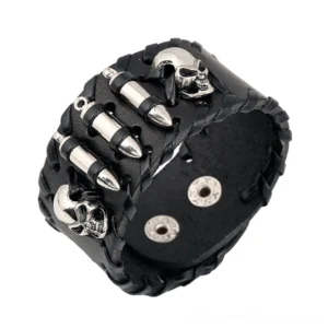 Black skull leather wrap bracelet with silver metal skull and bullet charms, toggle clasp closure, displayed on white background with oblique top-down view showcasing gothic punk design