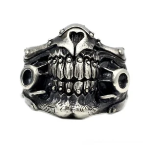 Gothic punk skull gas mask ring front view displaying dual air vents and detailed dentition