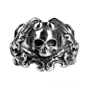Polished stainless steel gothic skull ring with curved ornate frame, flat front view displaying detailed skeleton motif