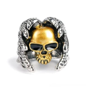Gothic skull biker ring front view, black enamel eyes with silver feather trims, punk metal jewelry