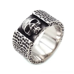 Gothic skull ring 316L stainless steel top oblique view with embossed skull design and hammered texture band