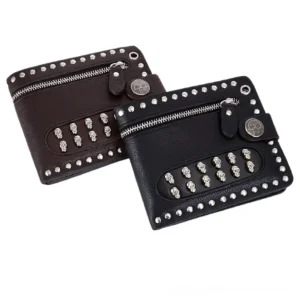 Black and brown gothic skull rivet wallets in oblique flat lay view showing both color options with branded skull straps