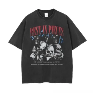 Rest in Pieces gothic skull oversized t-shirt front view with distressed black washed cotton and red typography graphic print