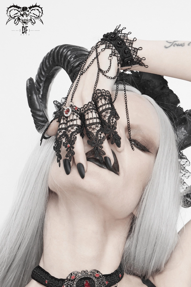 Gothic slave lace gloves with metal chain details and red gem accents, demonstrating alternative fashion aesthetic for women