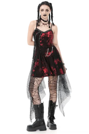Wine red and black tie-dye asymmetrical gothic slip dress with studded chain trim and fishnet overlay, front view on model