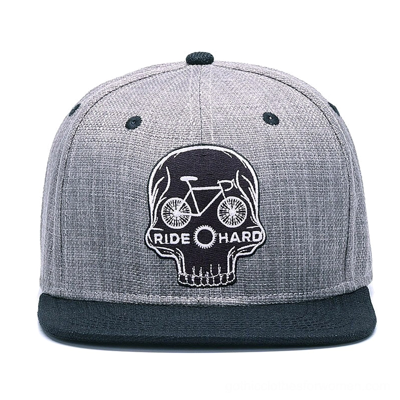 Front view of gothic snapback baseball cap featuring embroidered skull and ride hard text on heather gray