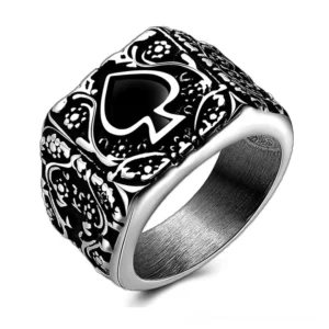Black spade stainless steel gothic ring top oblique view with floral engraving and silver-black two-tone finish