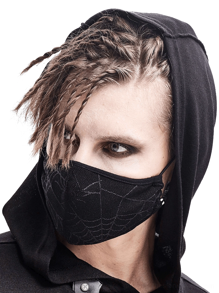 Gothic black spiderweb face mask worn by male model with braided hair in three-quarter front view against white background