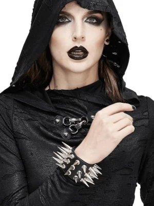 Black spiked leather gothic bracelet worn on female model's wrist, showcasing silver cone spikes and punk rock aesthetic