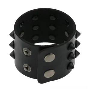 Top down view of black spiked leather bracelet displaying perforated inner layer with metal snap buttons and double row stud pattern