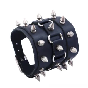 Side view of spike punk leather bracelet showing adjustable strap and multiple cone spike rows with silver metal accents