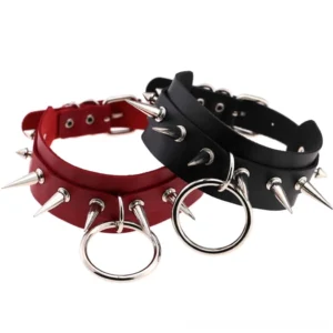 Double spiked leather gothic chokers with silver rivets and O-ring details in red and black, flat lay studio view