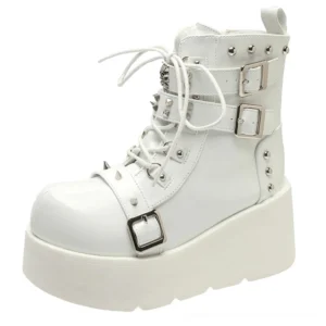 Gothic spiked platform ankle boot in white patent leather with buckles and rivets side view