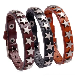 Three gothic star leather bracelets in black, brown, and camel displayed together on white background showing adjustable buckle design