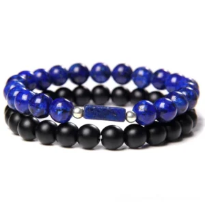 Lapis lazuli and matte black stone beaded bracelet with rectangular accent stone, double-layer gothic design, flat lay top view