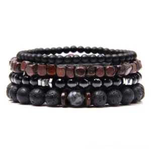 Gothic stone and wood beaded bracelet set flat lay overhead view showing multiple strands with black stone, lava stone, and brown wood beads mixed with silver accents