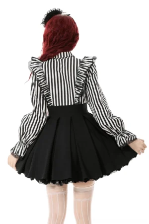 Black and white striped gothic dress back view on model - pleated high-waisted mini skirt and ruffled long sleeves