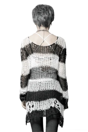 Back view of black white striped gothic sweater, displaying exposed cross-back camisole layer and distressed uneven hemline