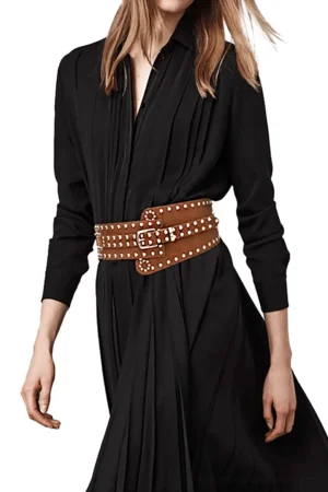 Tan brown gothic studded wide buckle belt worn on model, front half-body view showcasing square metal buckle and rivet details