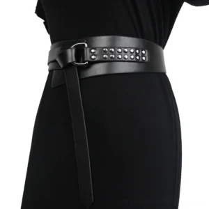 Black gothic studded leather corset belt worn on model, side waist view showing silver rivet detailing and square pin buckle