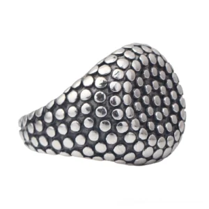 Gothic studded dome ring - side profile view displaying the substantial 20mm wide band and matte vintage metal finish with brushed inner band